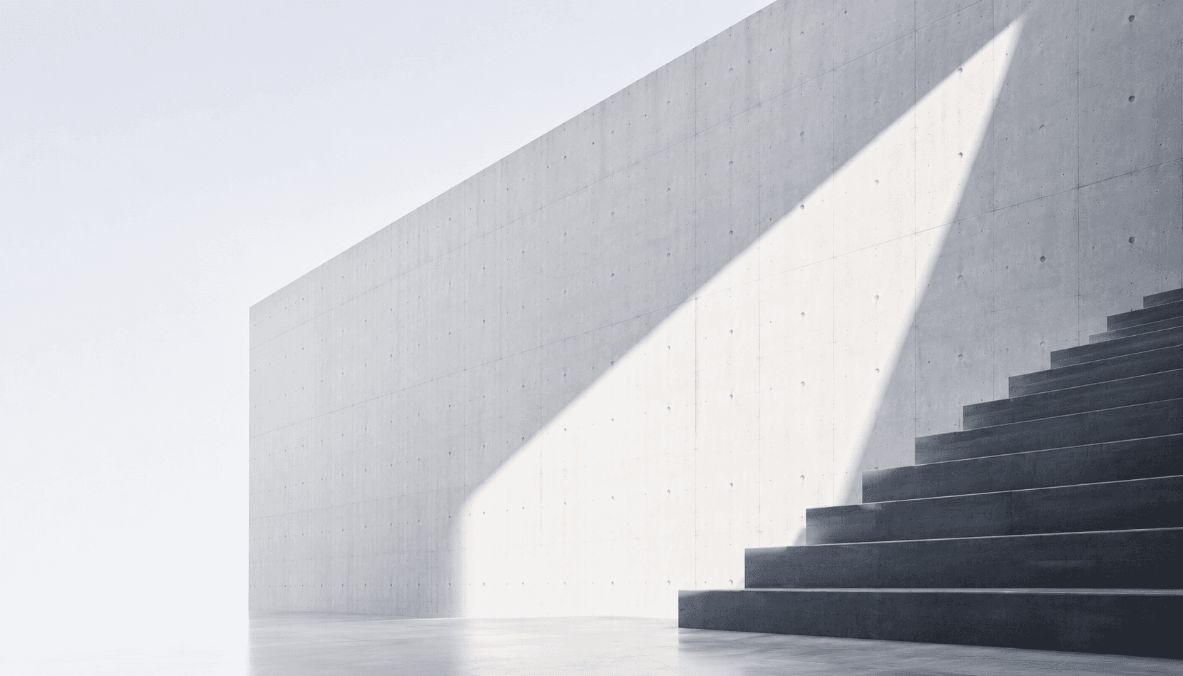 Minimalistische Betonarchitektur mit Treppen und Licht
